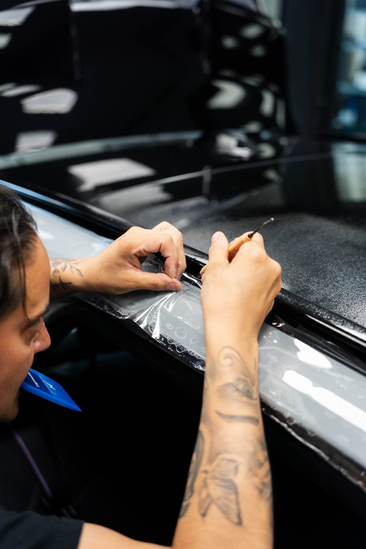 Marouflage du film de protection sur la M5 Touring